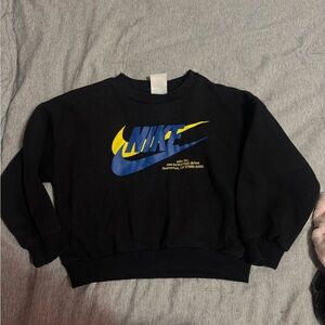Nike Crew Kids Black Sweatshirt with Blue and Yellow Accents
